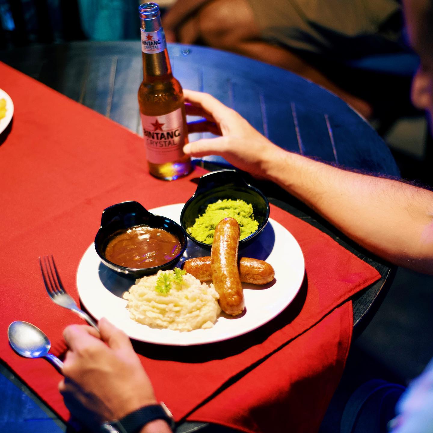 Bangers and mash, gravy and a Bintang at The Bucket